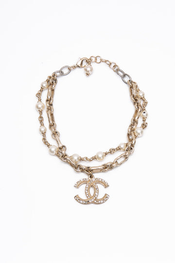 CHANEL Golden Pearl White Crystal CC Bracelet