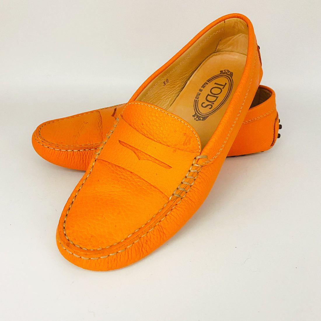 Tod's orange flat shoes