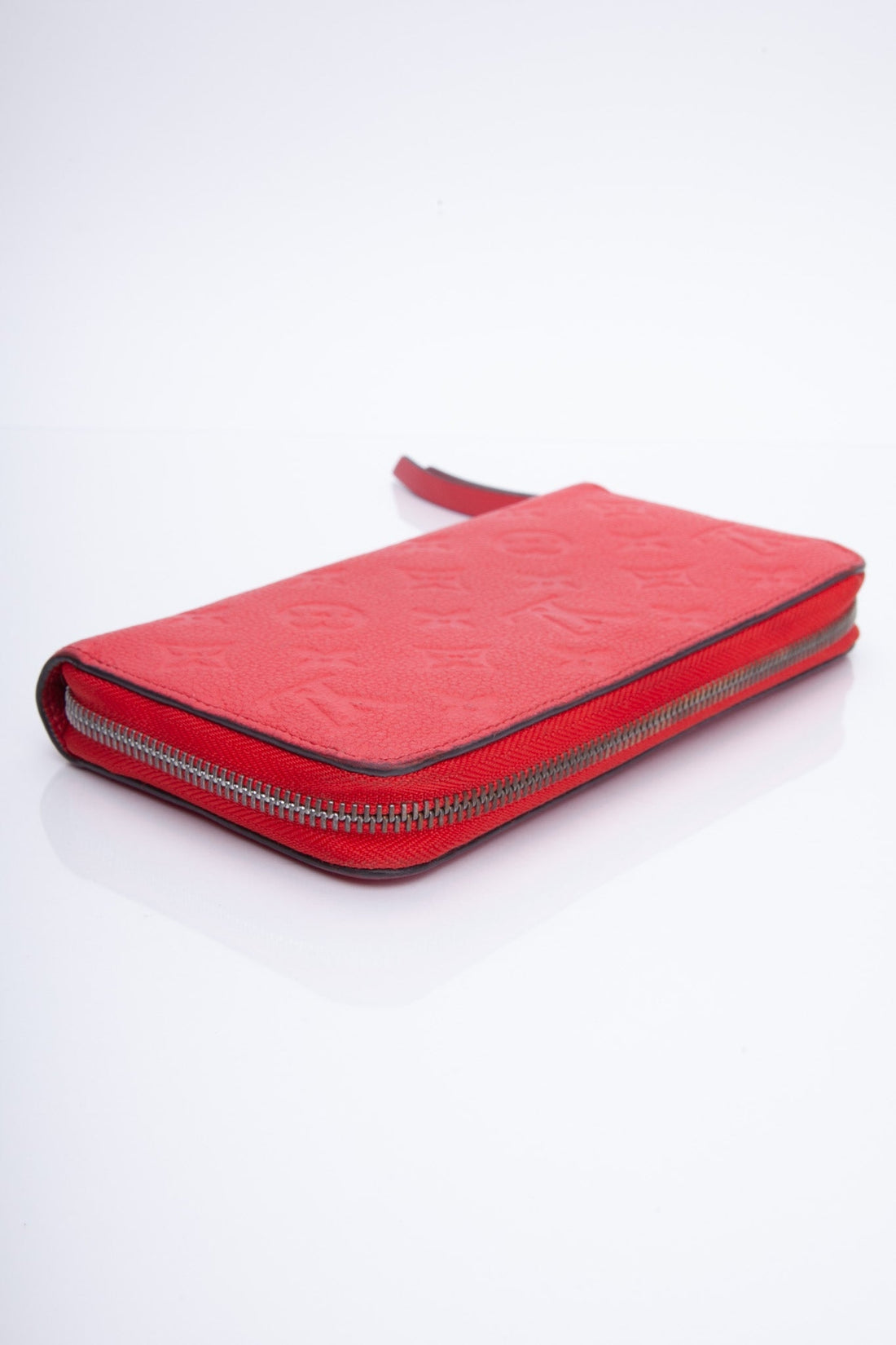 LOUIS VUITTON Monogram Empreinte Leather Zippy Wallet Red