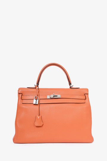 Hermès 2010 Orange Clemence Leather Kelly Retourne 35 Top Handle with Canvas Strap