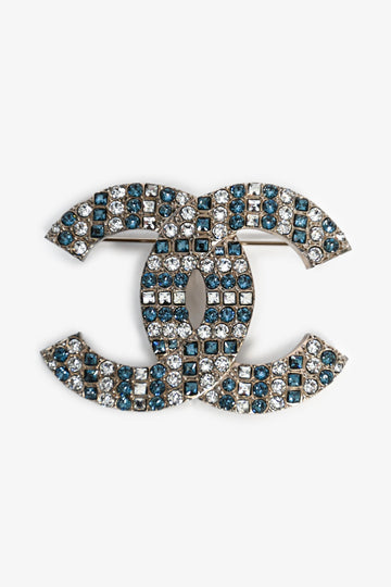 Chanel™ 2019 Silver Toned Blue Crystal Embellished CC Brooch