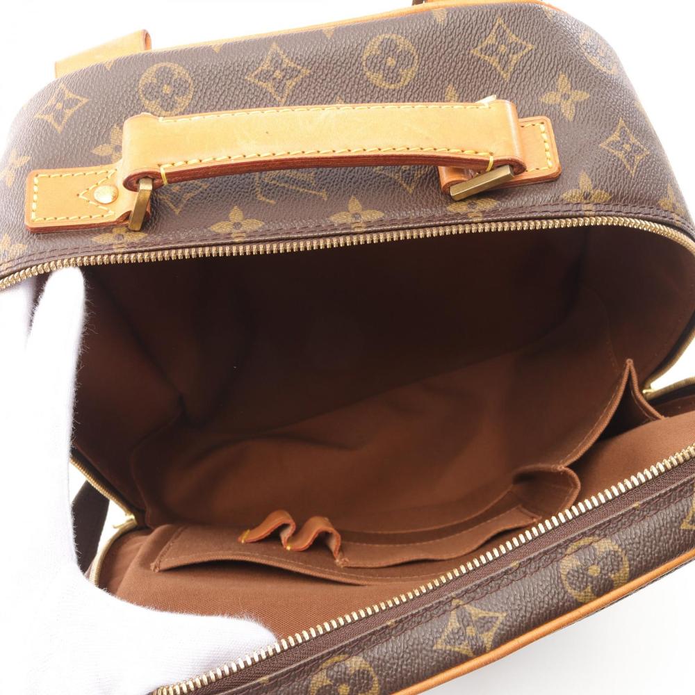 Brown Canvas Louis Vuitton Packall