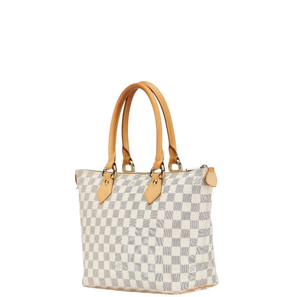 White Canvas Louis Vuitton Saleya