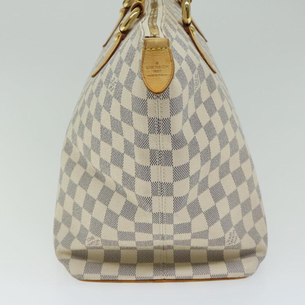 White Canvas Louis Vuitton Saleya
