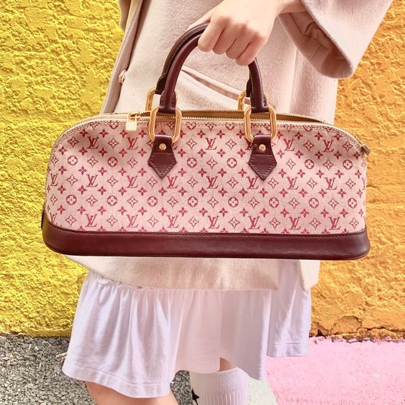 LOUIS VUITTON Vintage red Alma Long Handbag